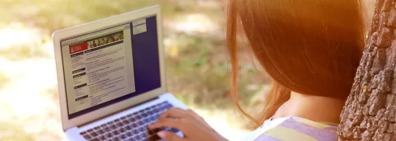 student on computer